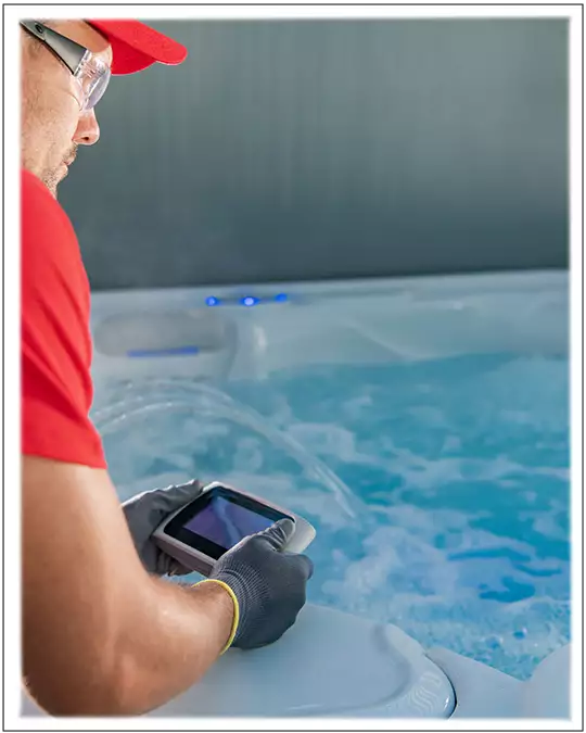 Service Person checking Spa Water Chemistry